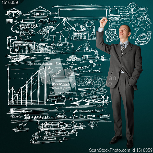 Image of businessman writing something