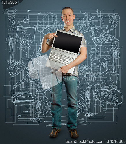 Image of man with open laptop in his hands