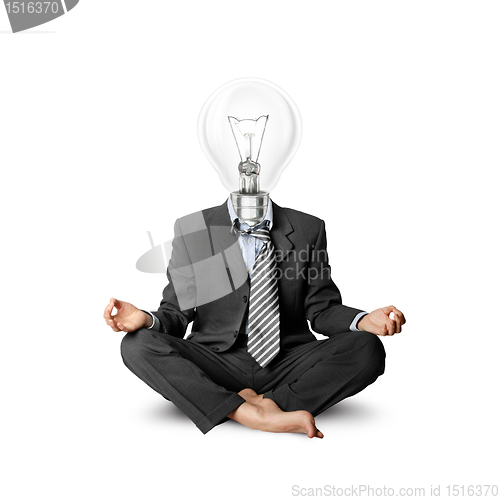 Image of lamp-head businessman in lotus pose