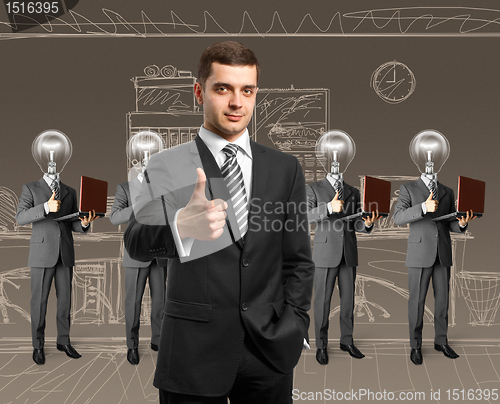 Image of lamp head business people with laptops