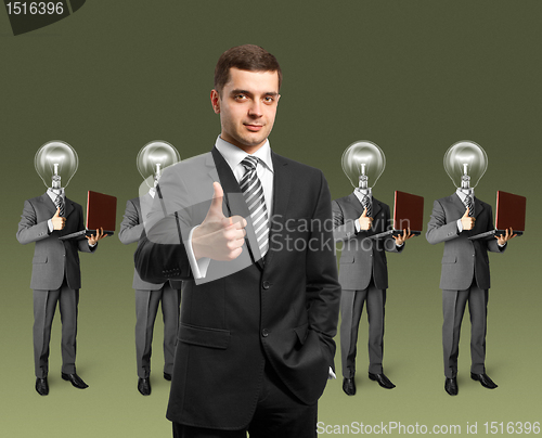 Image of lamp head business people with laptops