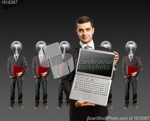 Image of lamp head businesspeople with laptop