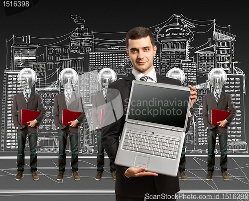 Image of lamp head businesspeople with laptop