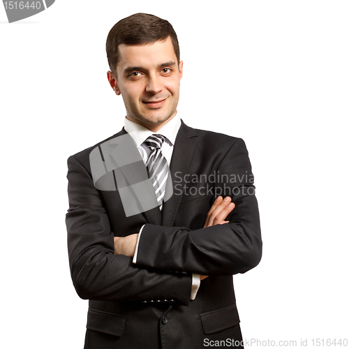 Image of male in suit with crossed hands