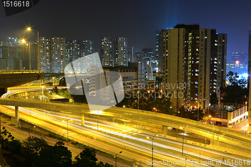 Image of traffic and highway at night