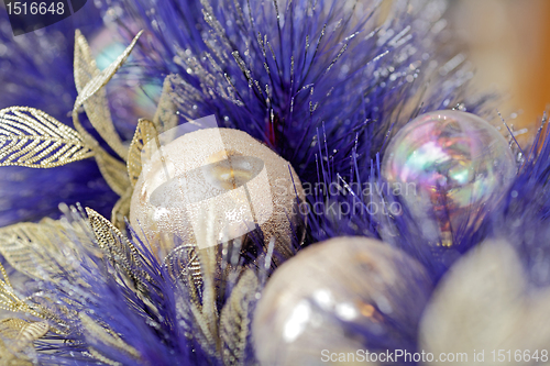 Image of christmas ball on blue color christmas tree