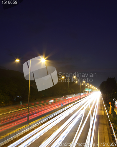 Image of traffic on highway at night