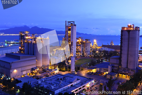 Image of cement factory at night