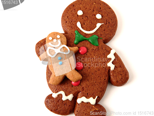 Image of Gingerbread man cookies on white background