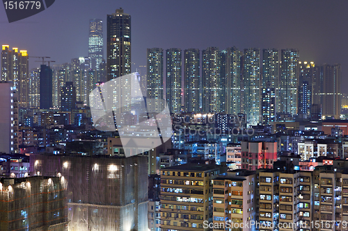 Image of apartment buildings at night