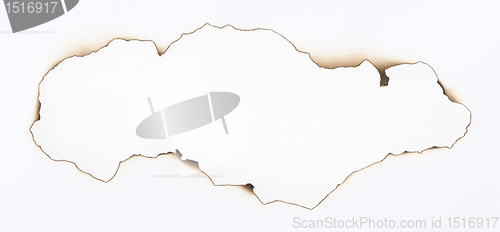 Image of Burned paper and hole
