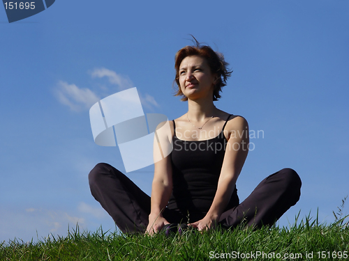 Image of Young woman enjoying life outdoor