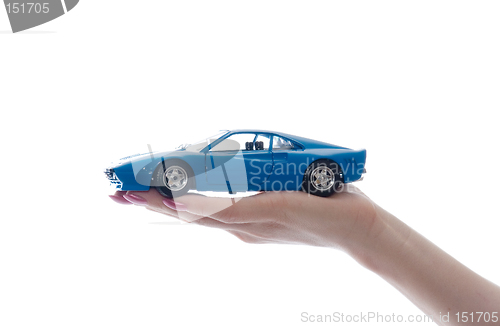 Image of Car toy on palm