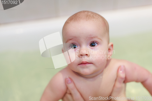 Image of Small baby bathing