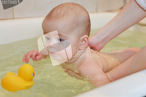 Image of Small baby bathing