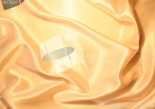 Image of Smooth elegant golden satin as background