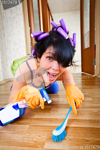 Image of housewife washes a floor