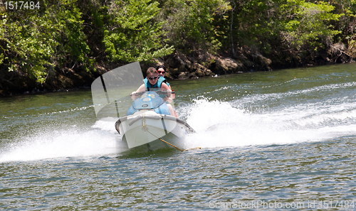 Image of scooter on the river