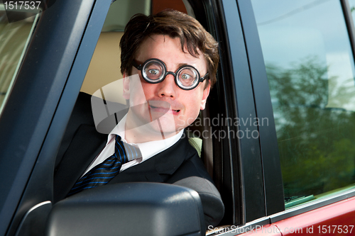 Image of man at the wheel the car
