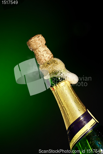 Image of opening champagne bottle