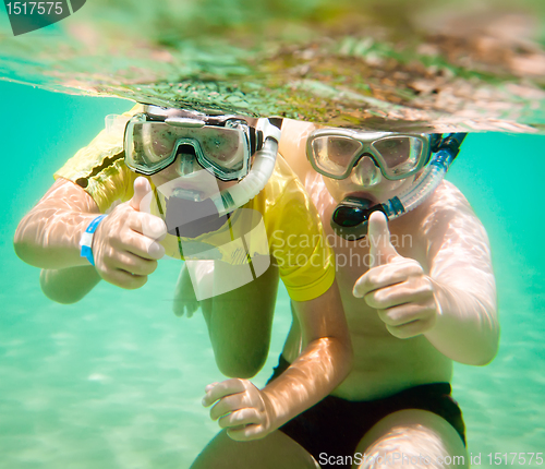 Image of Two boys underwater