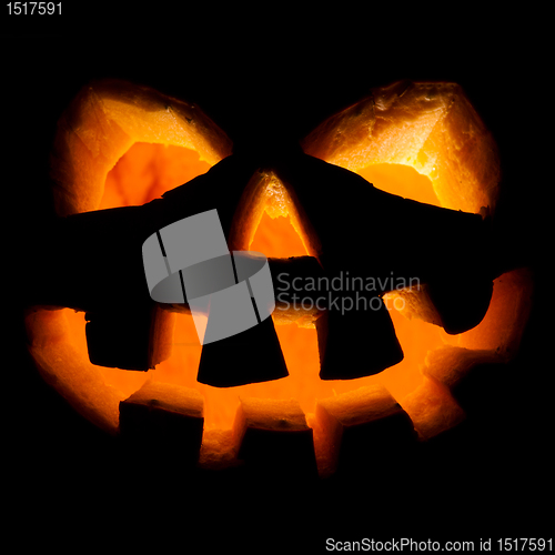 Image of halloween, old jack-o-lantern on black