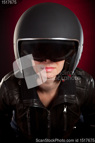 Image of Biker girl in a helmet