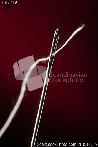Image of Needle with thread
