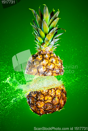 Image of Pineapple splashed with water