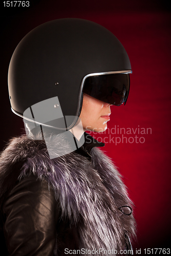 Image of Biker girl in a helmet