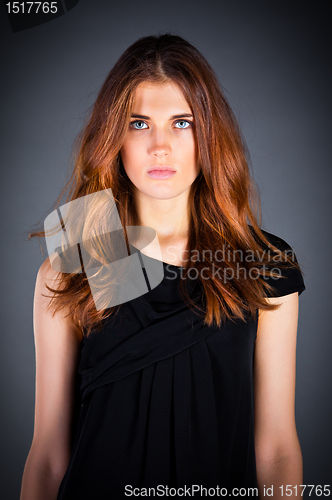 Image of beautiful girl on a dark background