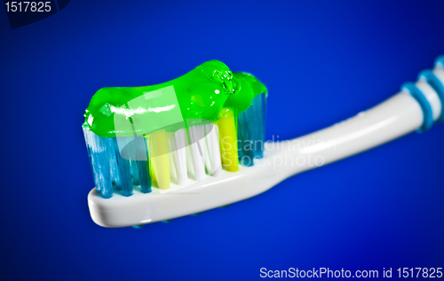 Image of toothbrush on a dark blue background