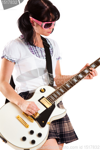 Image of girl with a guitar