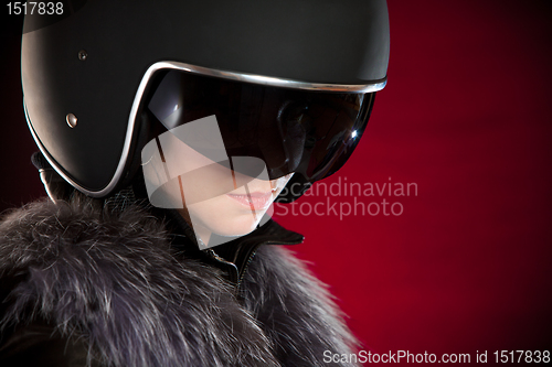 Image of Biker girl in a helmet