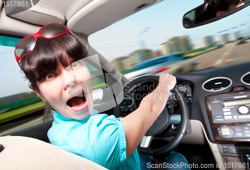 Image of women driving a car