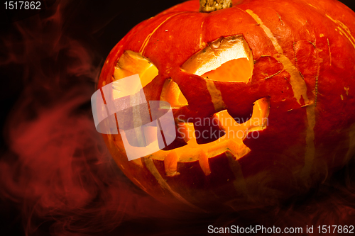 Image of halloween, old jack-o-lantern on black