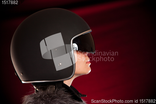 Image of Biker girl in a helmet