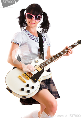 Image of girl with a guitar