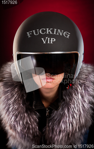 Image of Biker girl in a helmet