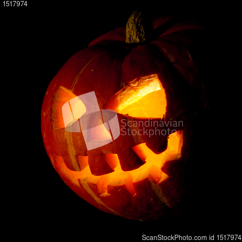 Image of halloween, old jack-o-lantern on black