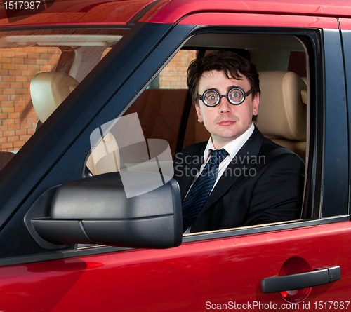 Image of man at the wheel the car