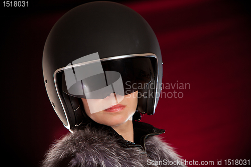 Image of Biker girl in a helmet