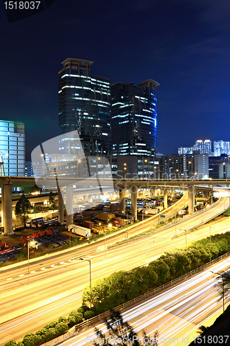 Image of traffic and highway at night