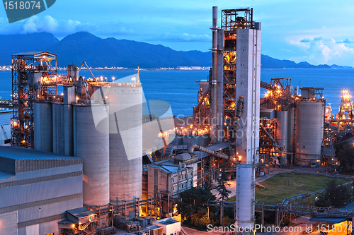 Image of cement factory at night