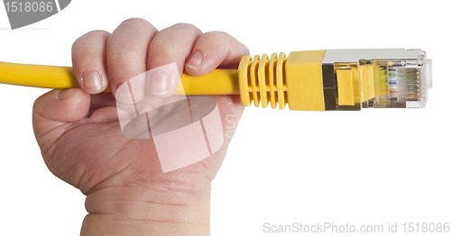 Image of baby holding yellow network plug