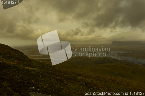 Image of dark landscape with deep clouds