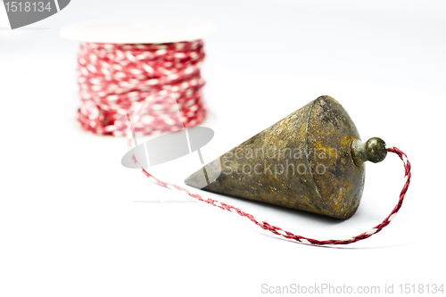 Image of plumb bob with on white background