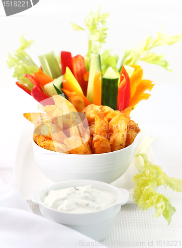 Image of Raw vegetable and wedges with dip