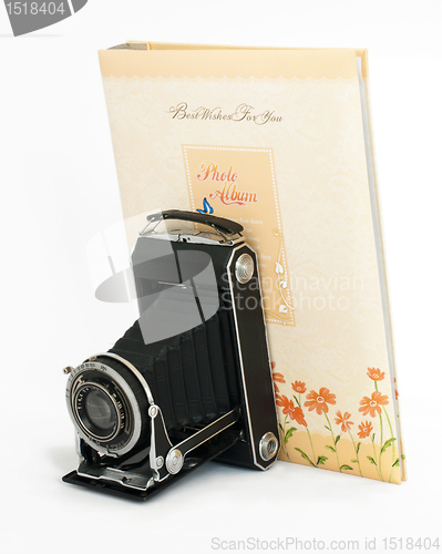 Image of Old vintage camera and Photo Album