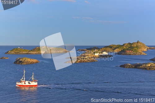 Image of Fishing boat and tiny islets